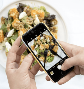 Take photos of your meals to share with your personal fitness coach.
